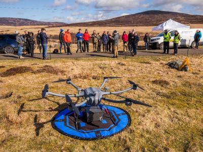 The drone and a group of onloookers