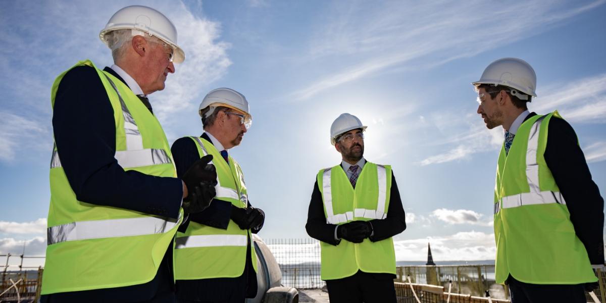 L-r Dr David McBeth, Professor Iain Gillespie, First Minister Humza Yousaf, and Cllr John Alexander on the rooftop of the University of Dundee’s Life Sciences Innovation Hub